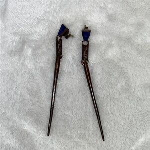 A peace treaty, blue stone dangle earrings